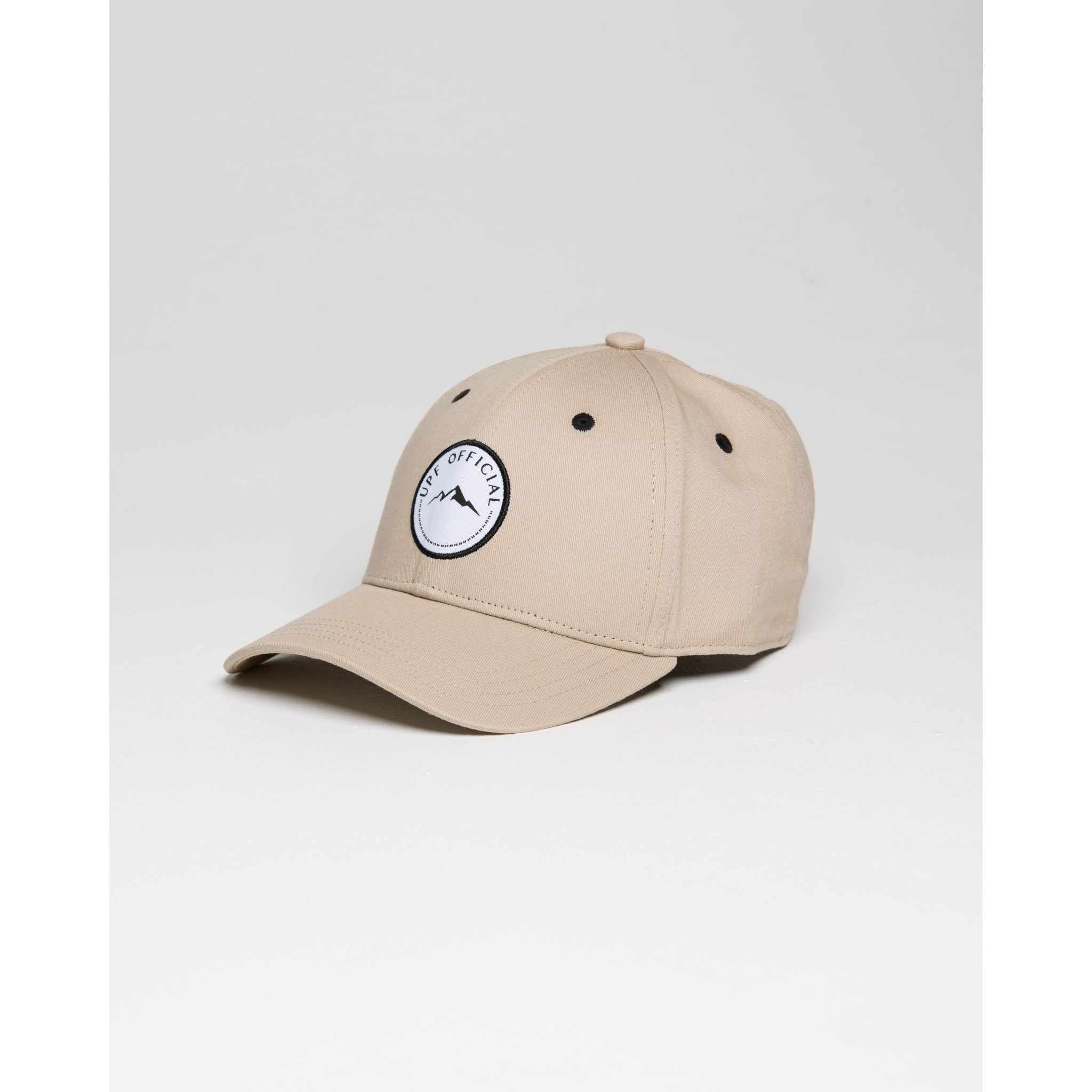 Beige cap with a logo on a light gray background