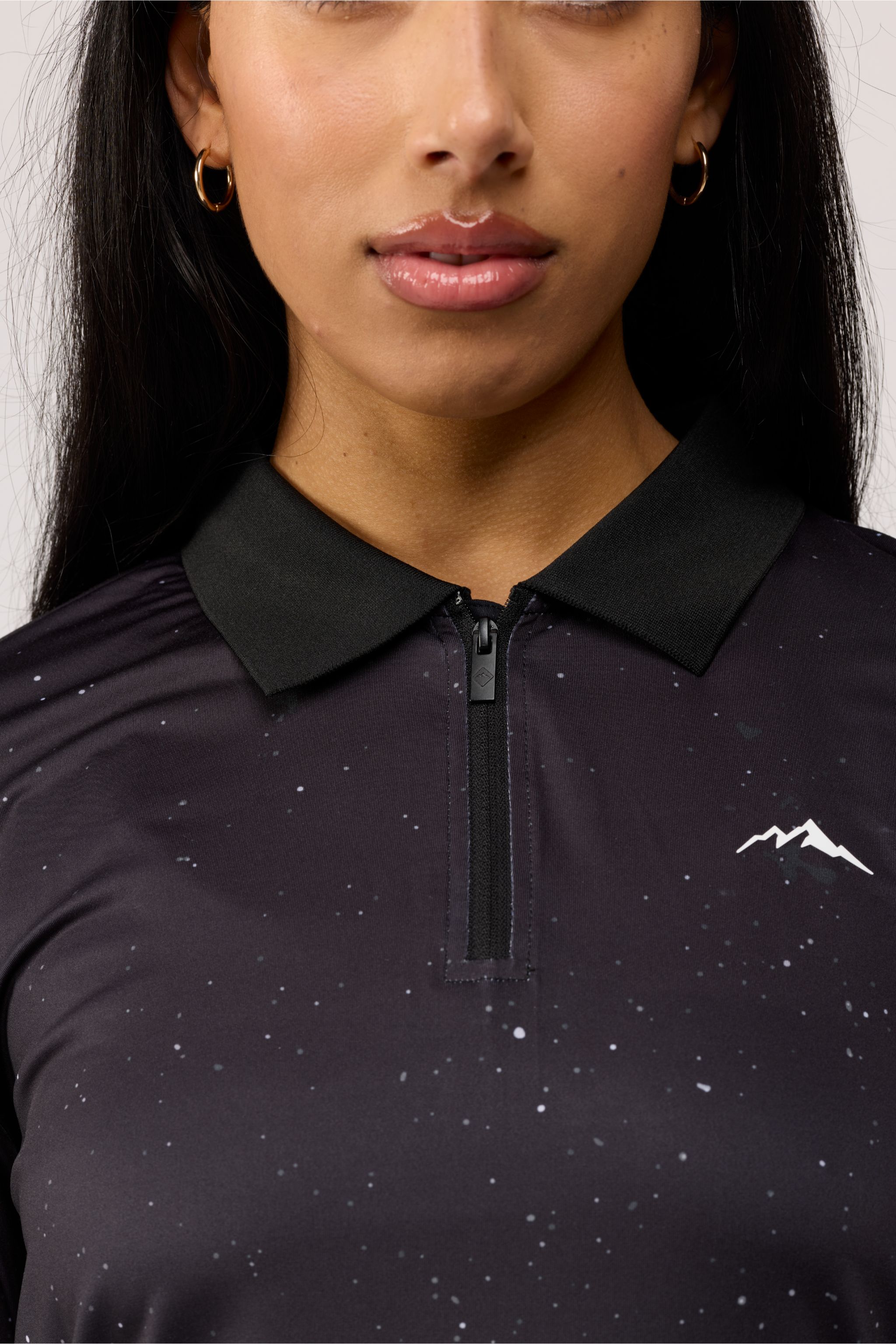 Close-up of front chest area of Solar Line t-shirt showing fine stitching and premium cotton texture.