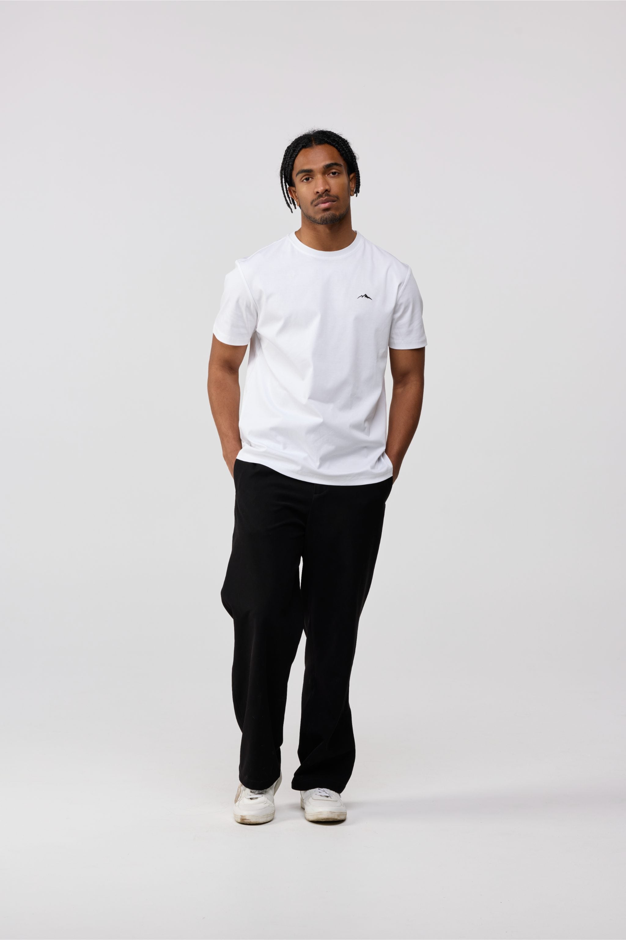 Front view of men’s white cotton crewneck t-shirt with classic short sleeve fit.