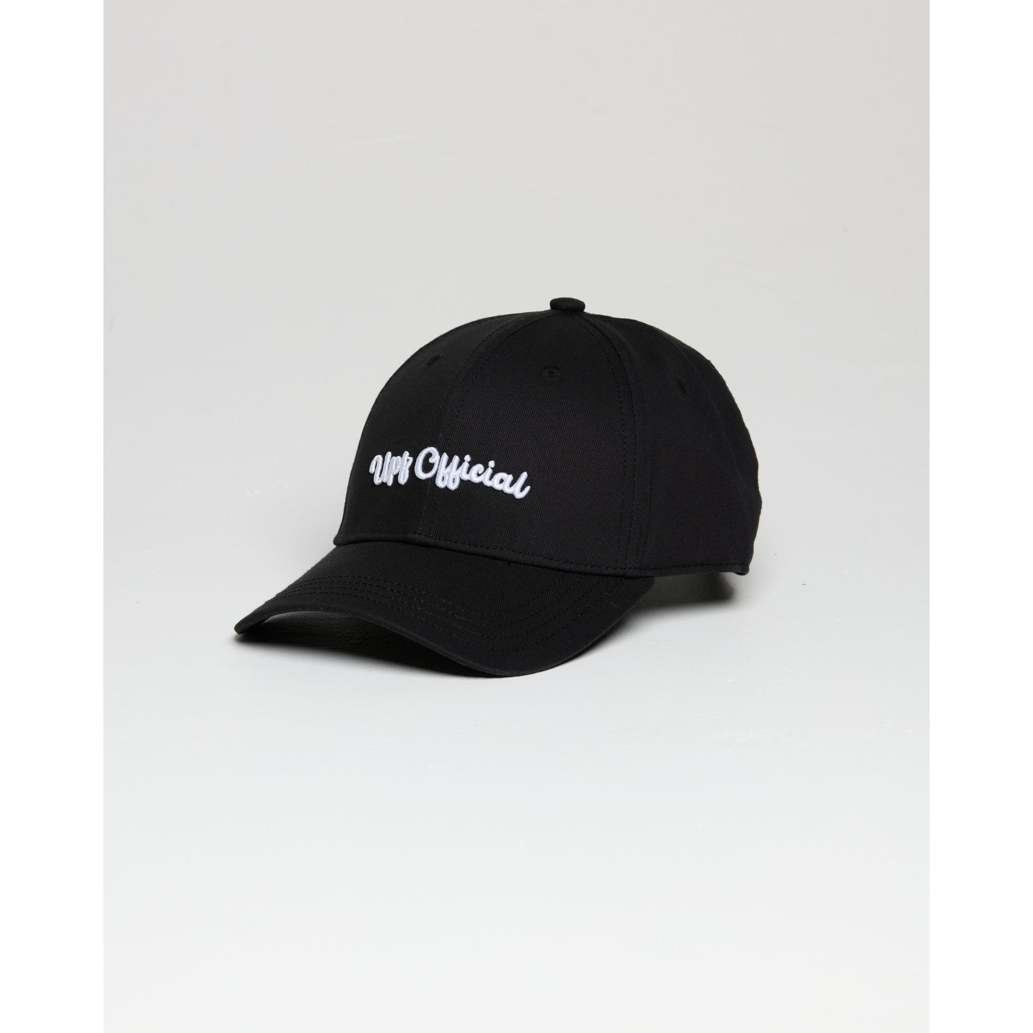 Black cap with white text on a light gray background