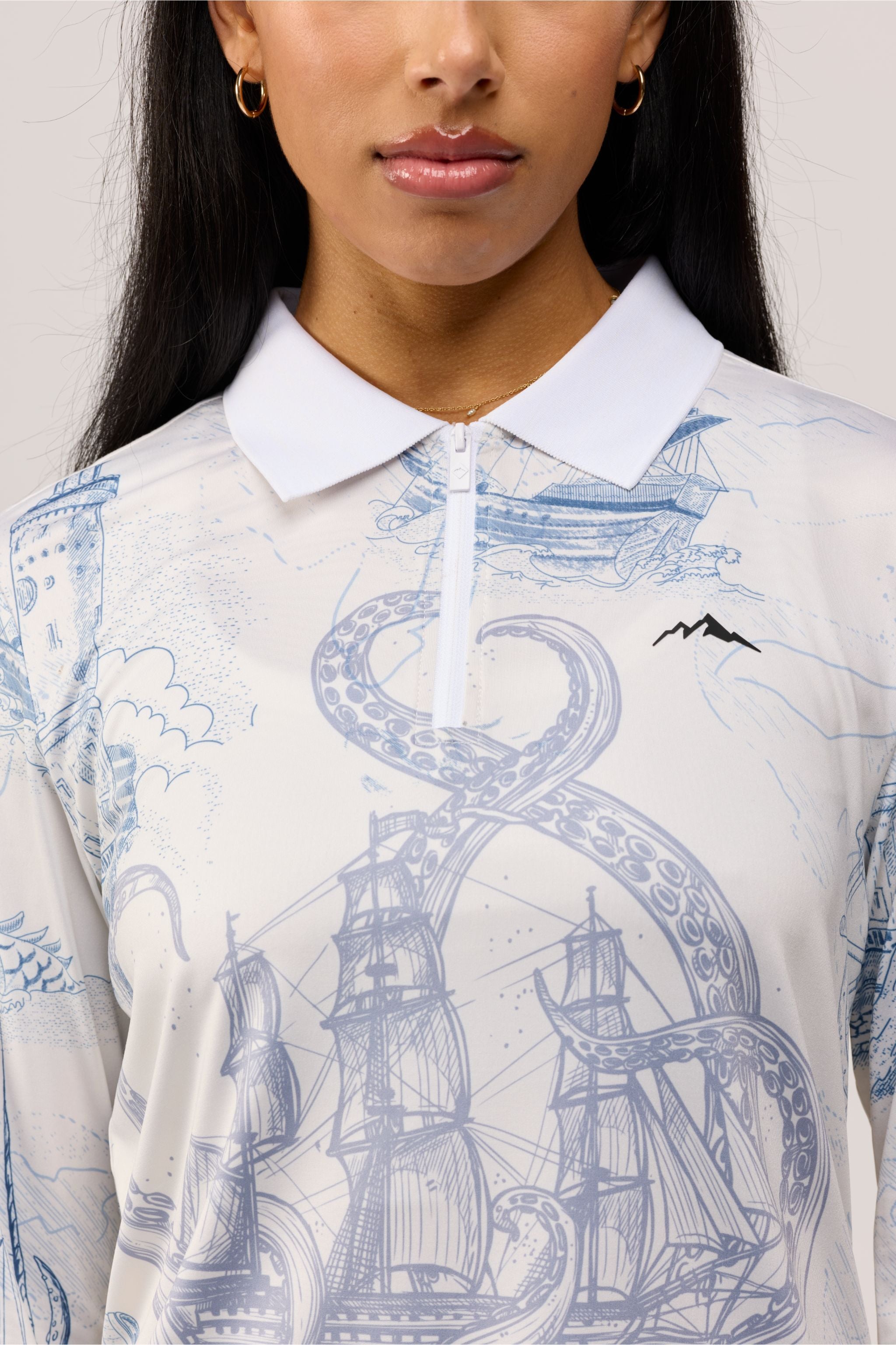 Close-up of women’s Kraken Domain t-shirt blue kraken artwork print.