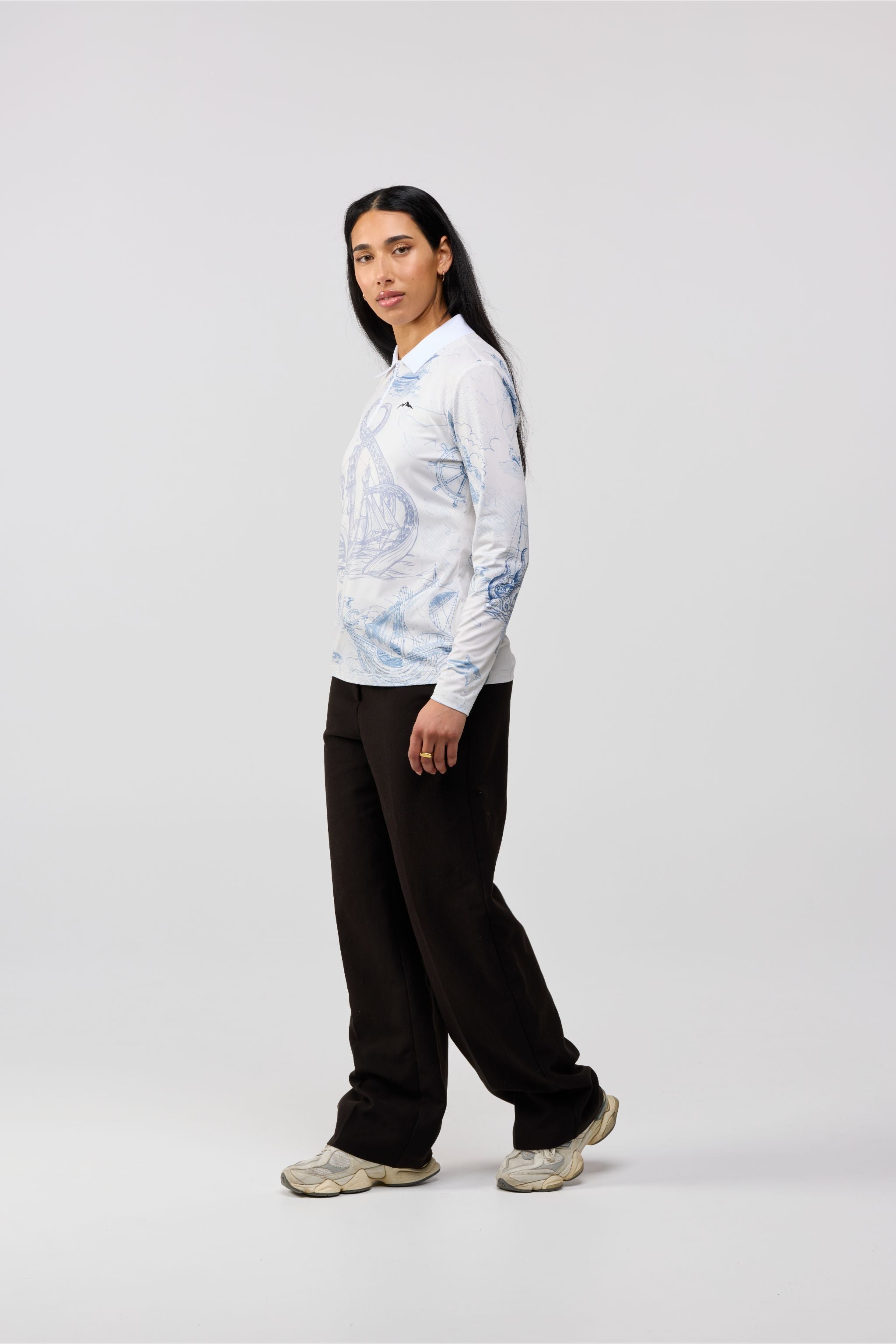 Side profile of women’s Kraken Domain nautical graphic tee.