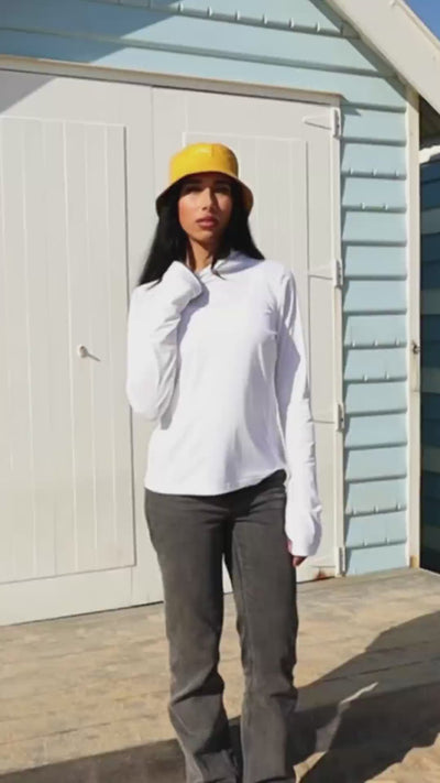 UPF Official branded hero video featuring a female model posing confidently in premium apparel, accompanied by a cool, modern soundtrack.