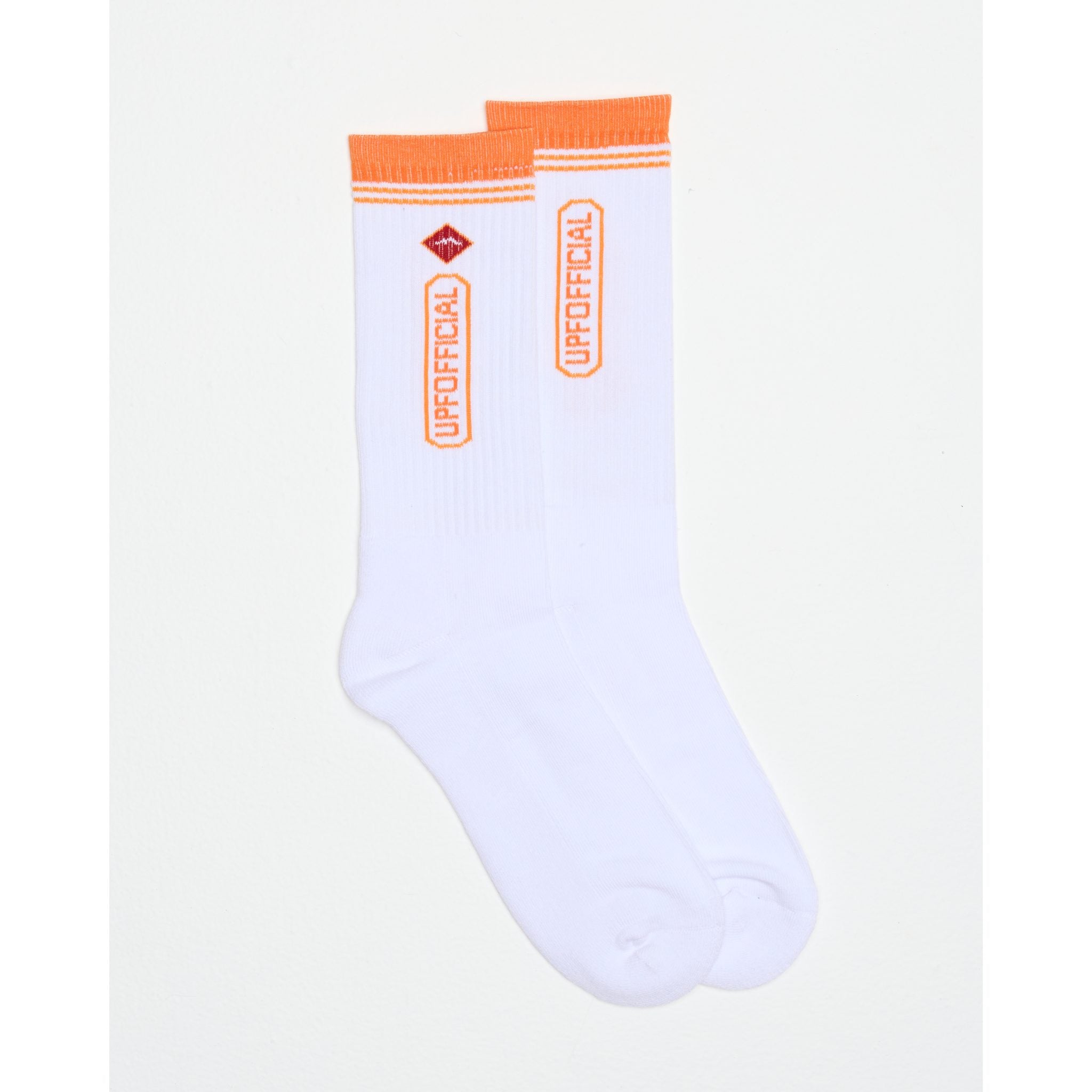 White socks with red and orange accents on a light grey background, upf official premium socks